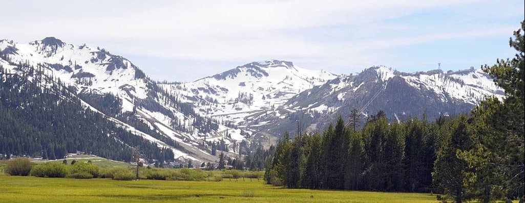 Olympic Valley meadow with the surrounding peaks.